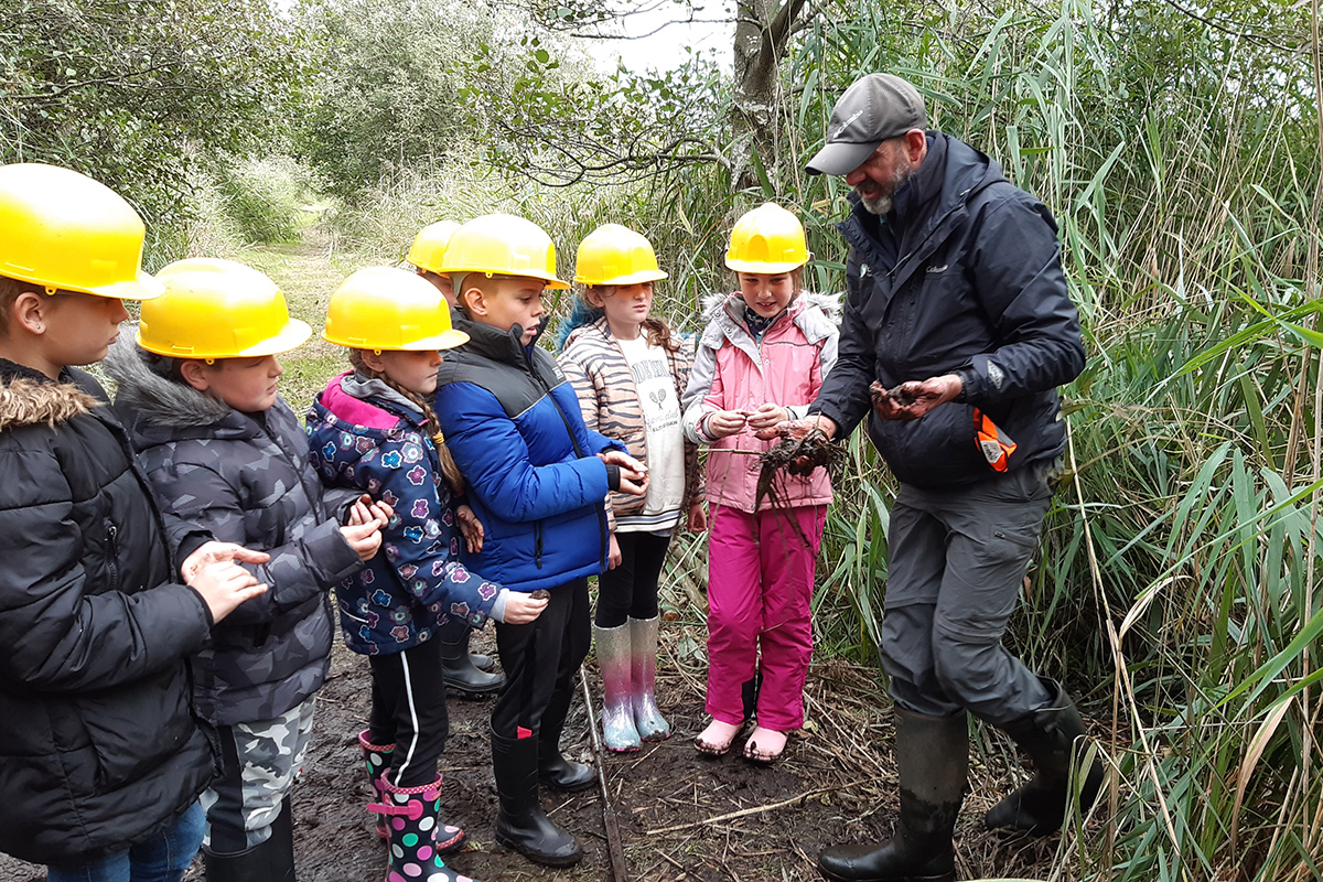 Nick Sanderson talking to a group of children as part of the Generation Green Project